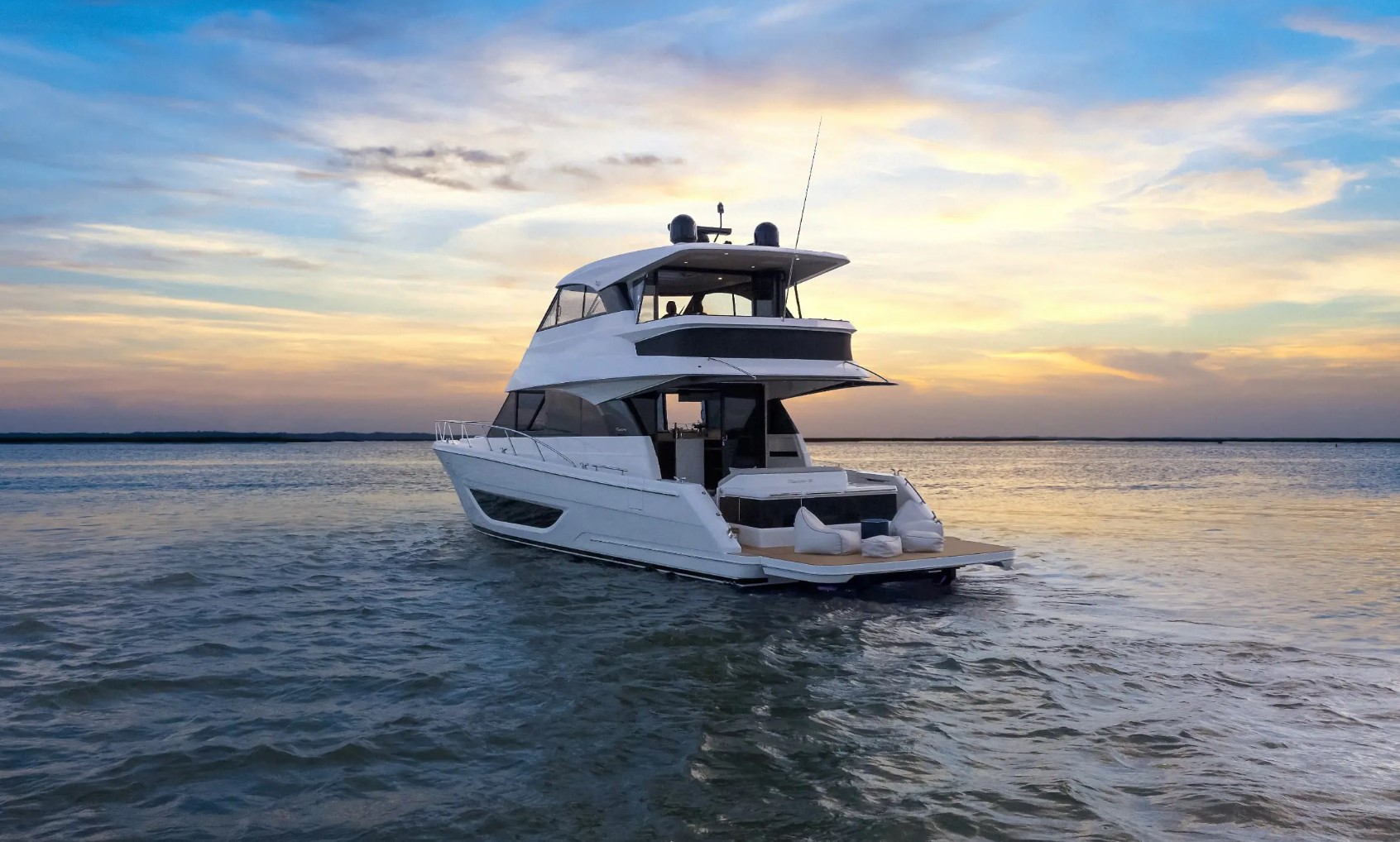 Maritimo luxury yacht at sunset on Auckland waters